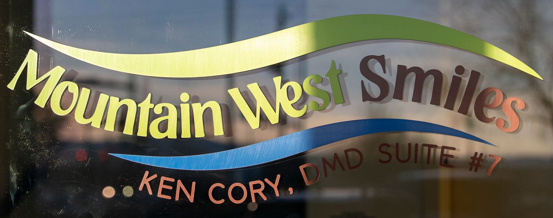 Sign with business names: High Country Properties, Middleton Accounting, and Ken Cory, D.M.D., at 1425 Upstairs.