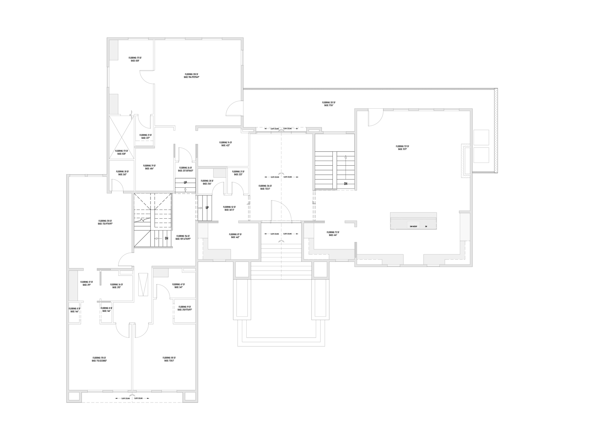 Architectural floor plan of a multi-room building, showing layout with rooms, stairs, and doors.