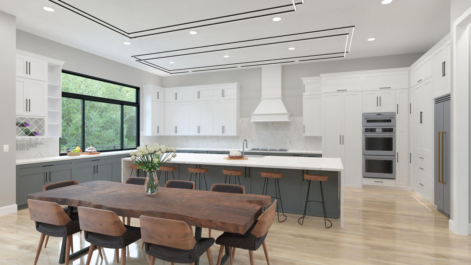 Modern kitchen with gray and white cabinets, large island, and wooden dining table with chairs.
