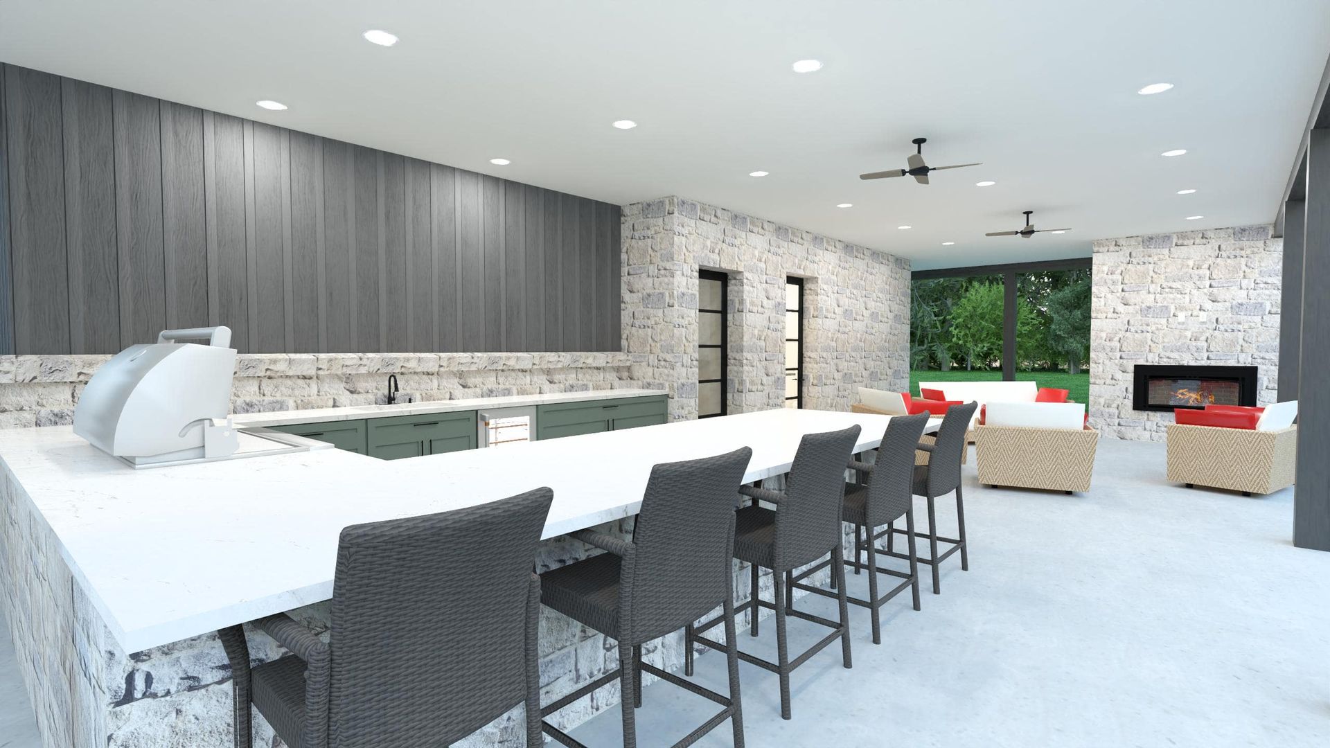 Spacious outdoor kitchen with long white countertop and gray barstools. Fireplace and backyard view.