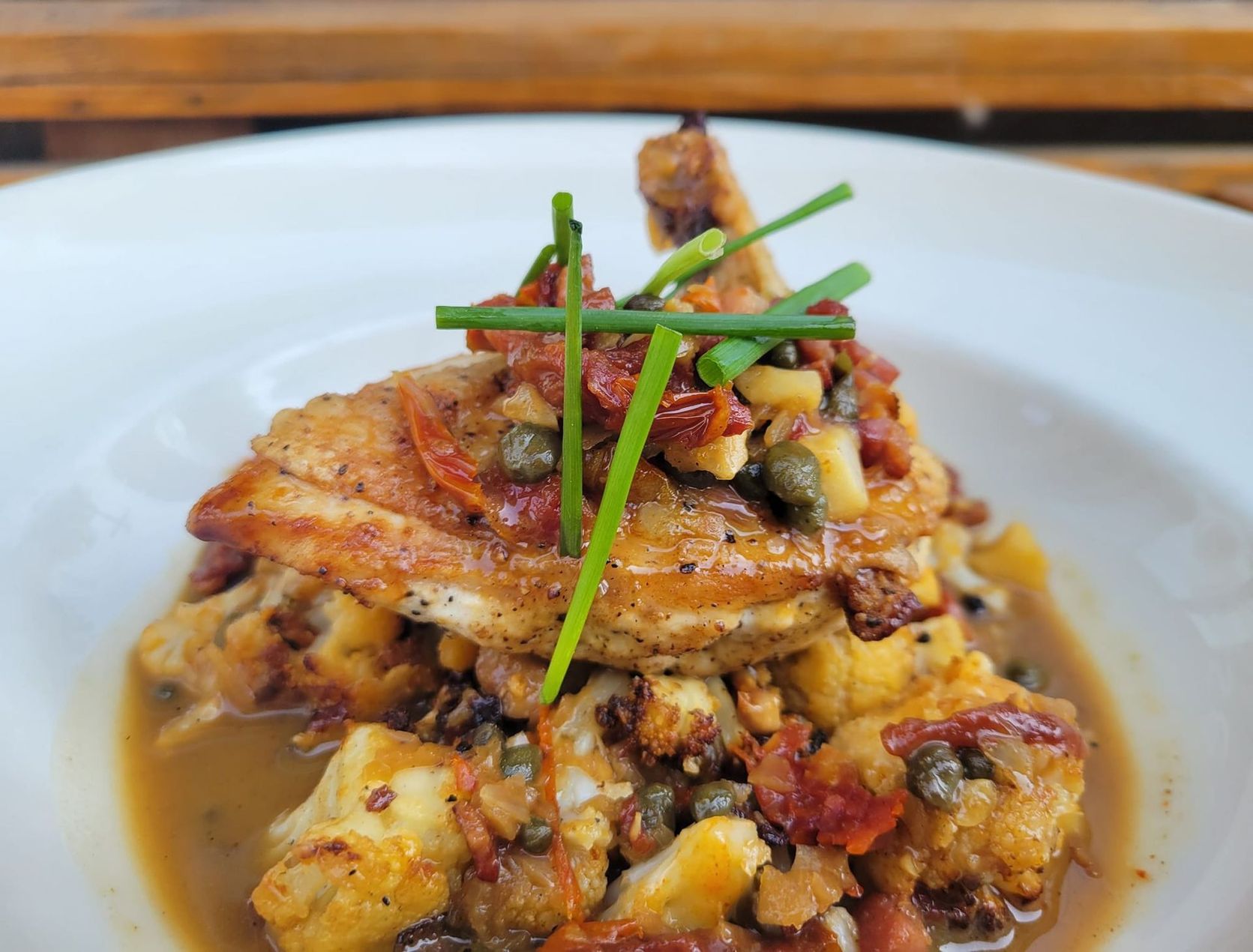 A close up of a plate of food on a table.