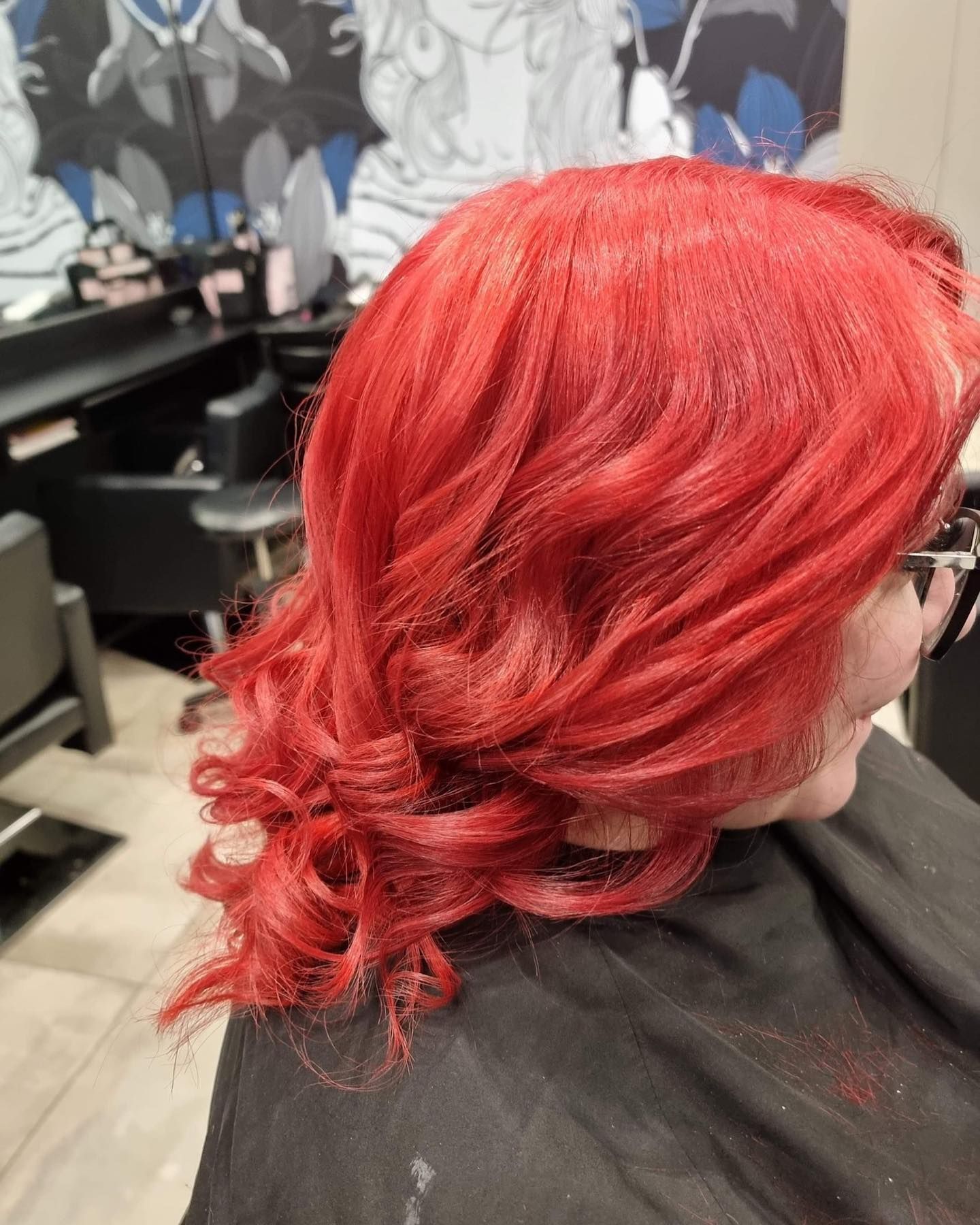 Woman With Bright Red Curly Hair in a Salon Chair — Wow! Excellence in Hair in Toowoomba, QLD