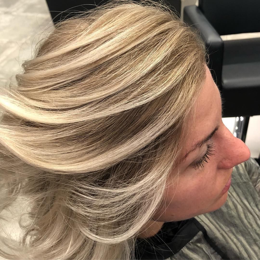 Woman With Blonde Highlights in a Salon Chair — Wow! Excellence in Hair in Toowoomba, QLD
