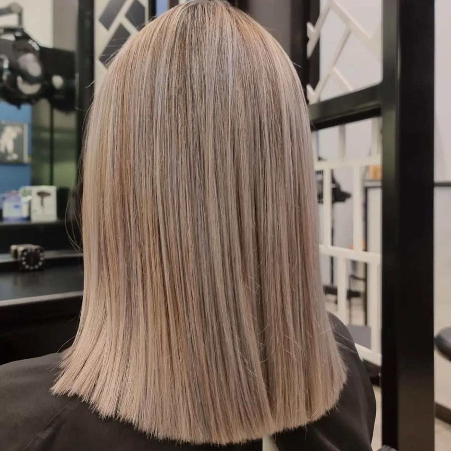 Back View of a Person With Straight, Ash-blonde, Shoulder-length Hair — Wow! Excellence in Hair in Toowoomba, QLD