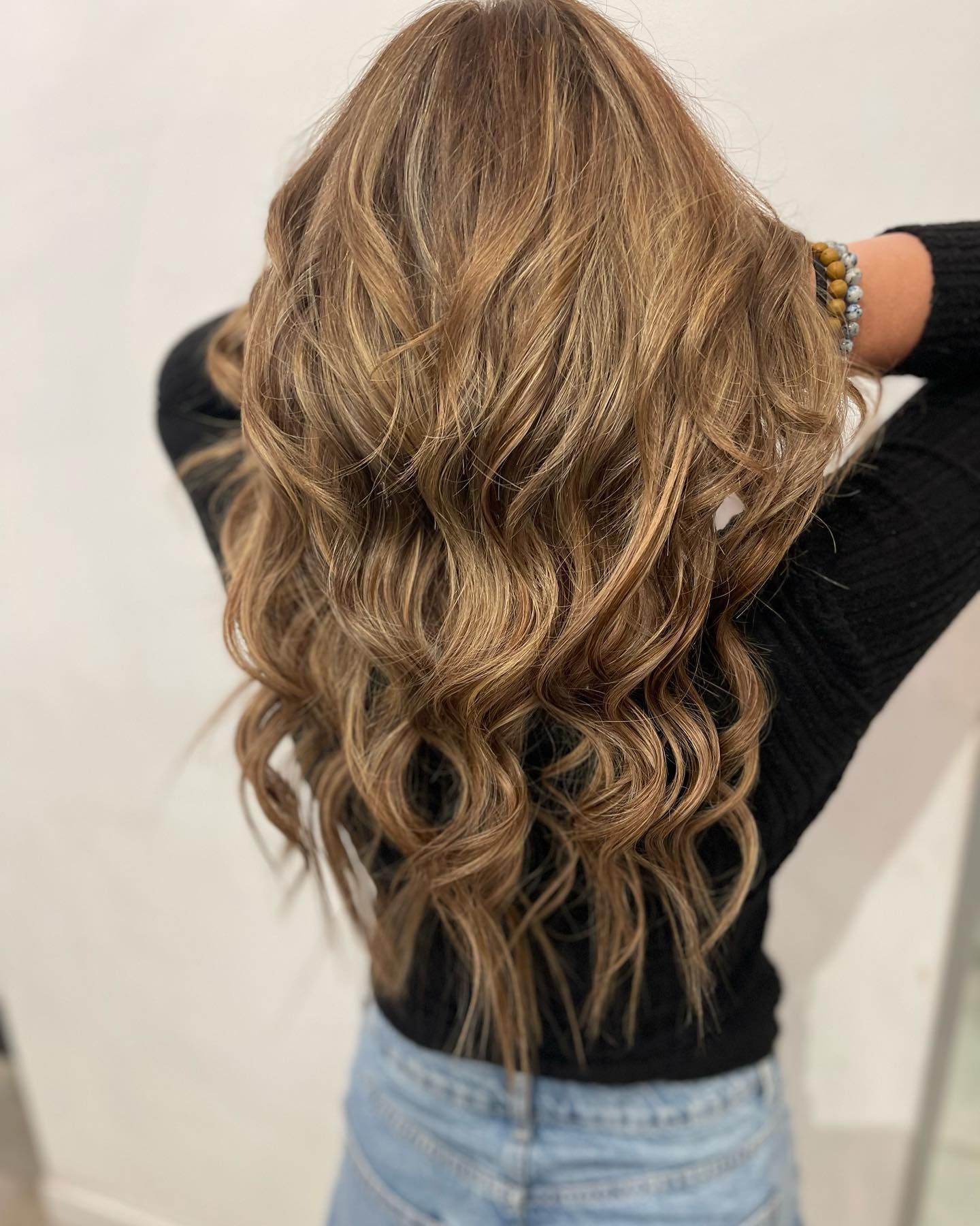 Woman With Long, Wavy, Highlighted Brown Hair — Wow! Excellence in Hair in Toowoomba, QLD