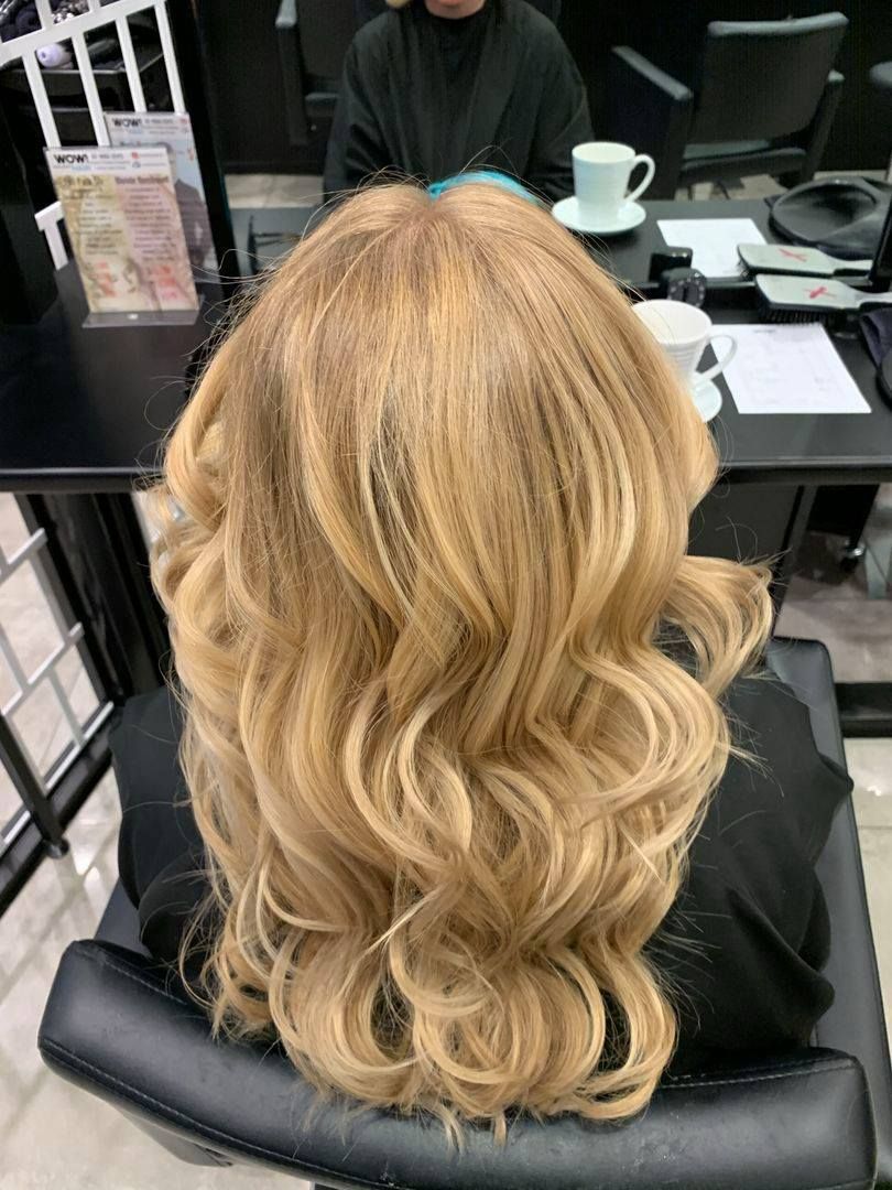 Woman With Blonde, Wavy Hair in a Salon Chair — Wow! Excellence in Hair in Toowoomba, QLD