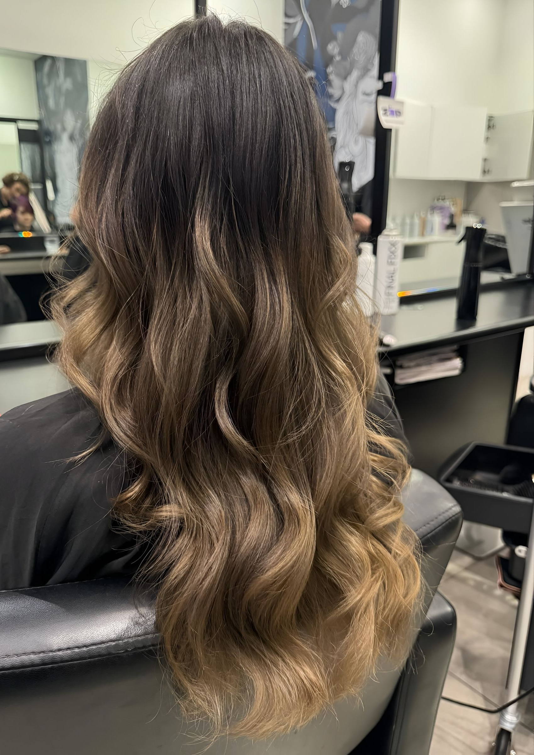 A Person's Long, Wavy Hair — Wow! Excellence in Hair in Rangeville, QLD
