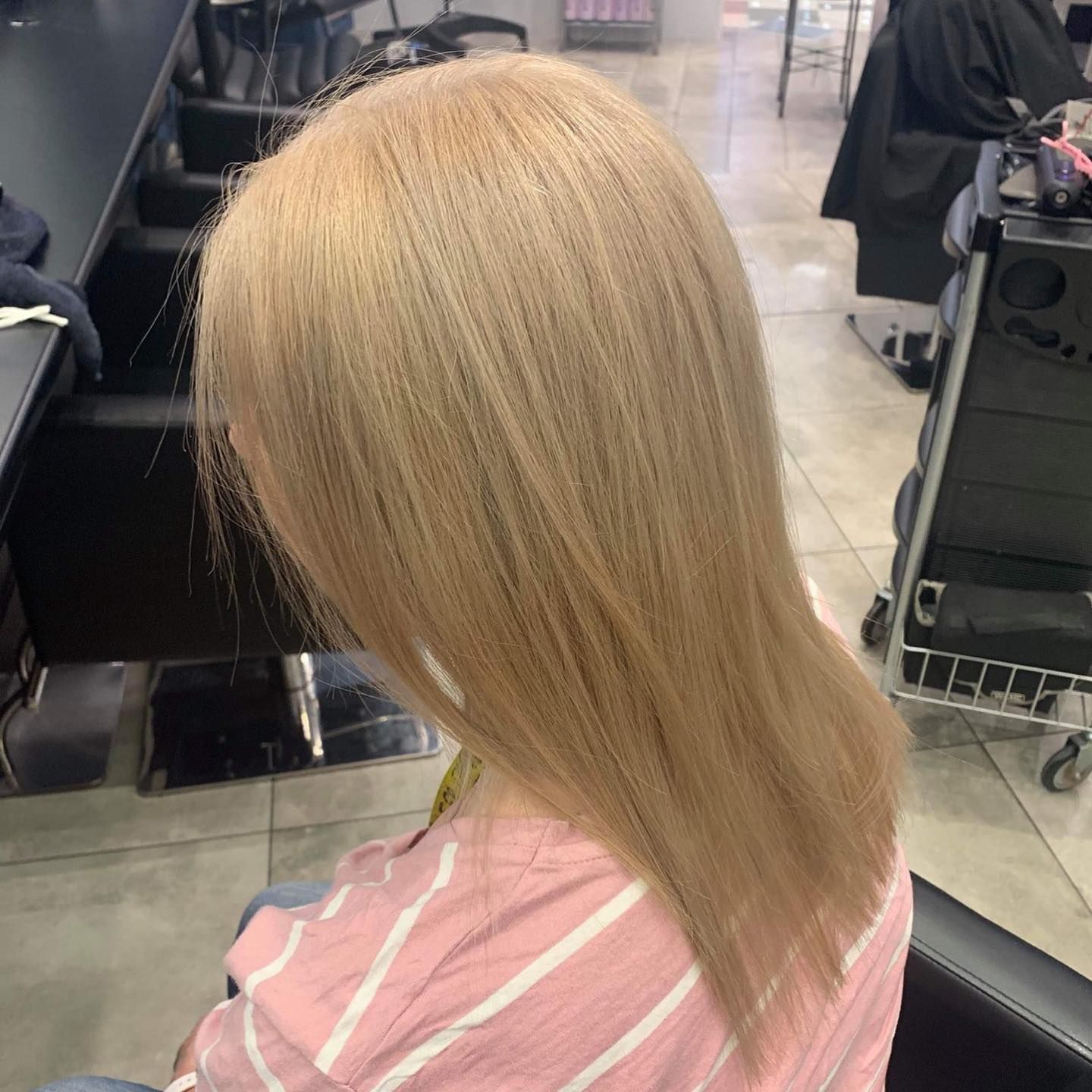 Woman With Long, Light Blonde Hair in Salon Chair — Wow! Excellence in Hair in Toowoomba, QLD