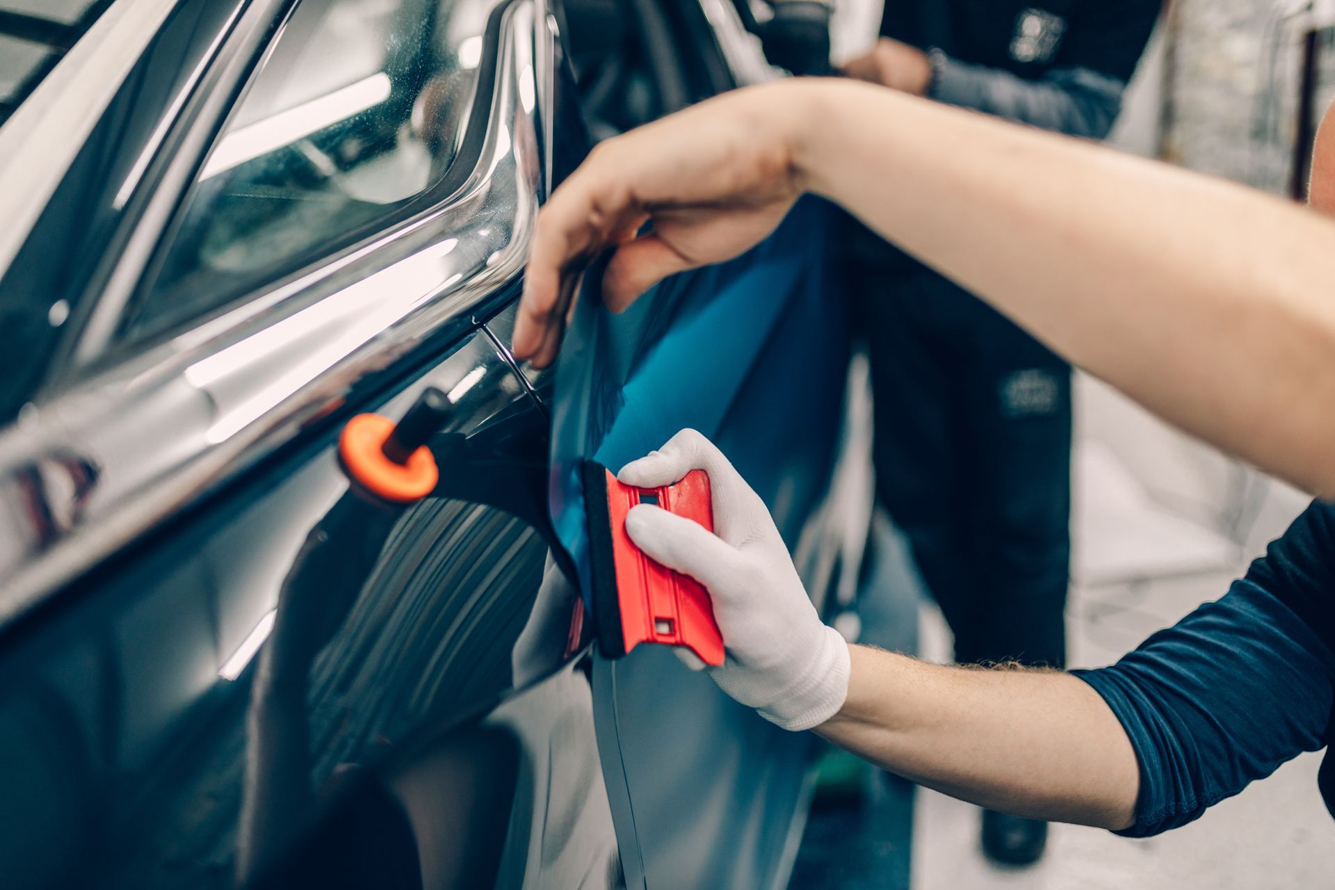 Painting A Car Red — Miramar, FL — Oscar Tint Solutions