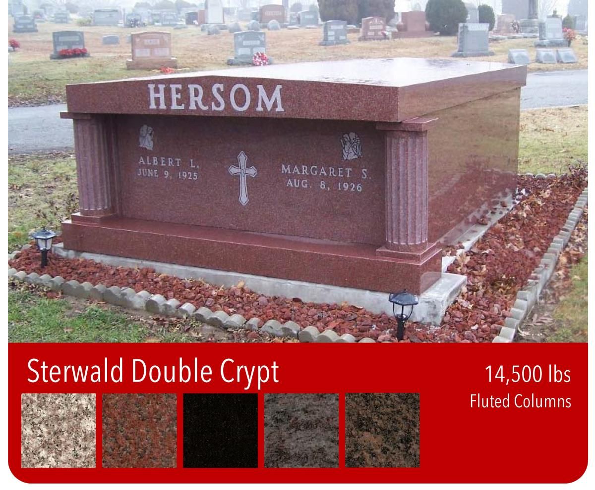 A cemetery filled with lots of graves and flowers.