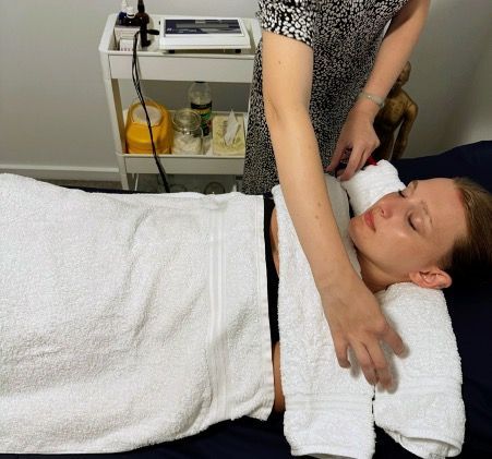 A Woman Is relating pre treatment — Resonance Health Studio in Wauchope, NSW