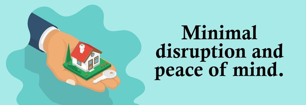 Hand holding a small house with key; text says 