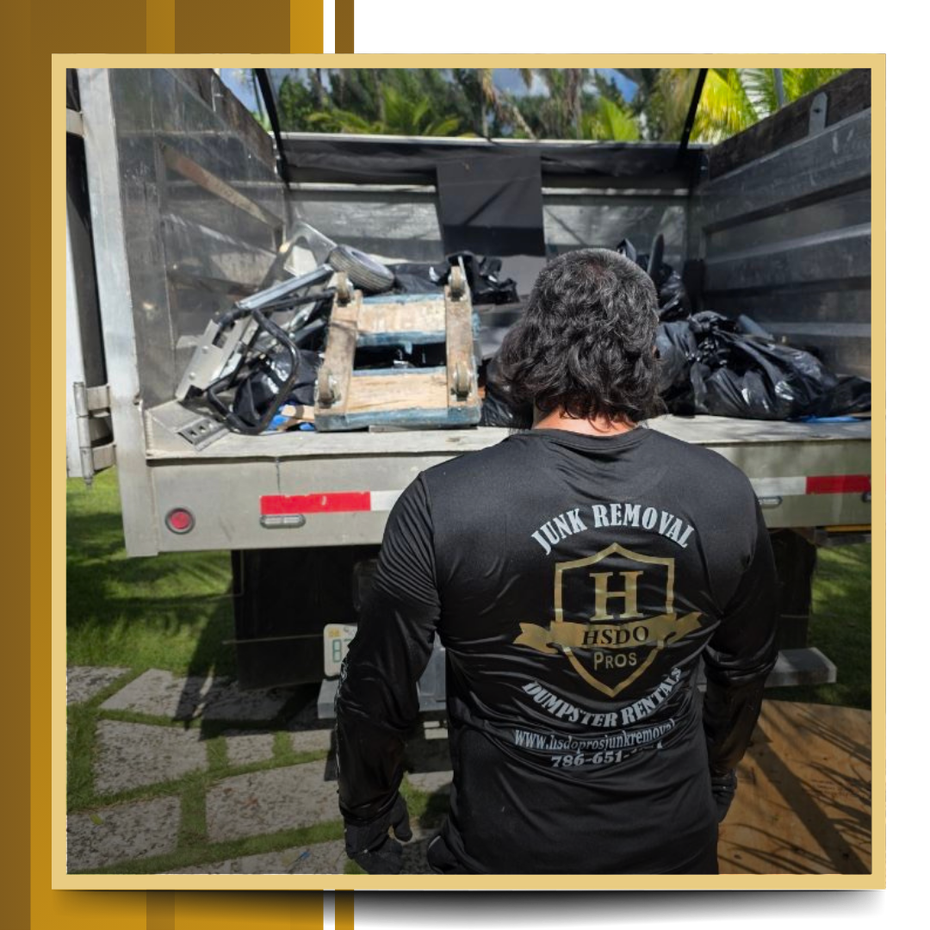 HSDO Junk Removal two guys on the dumpster