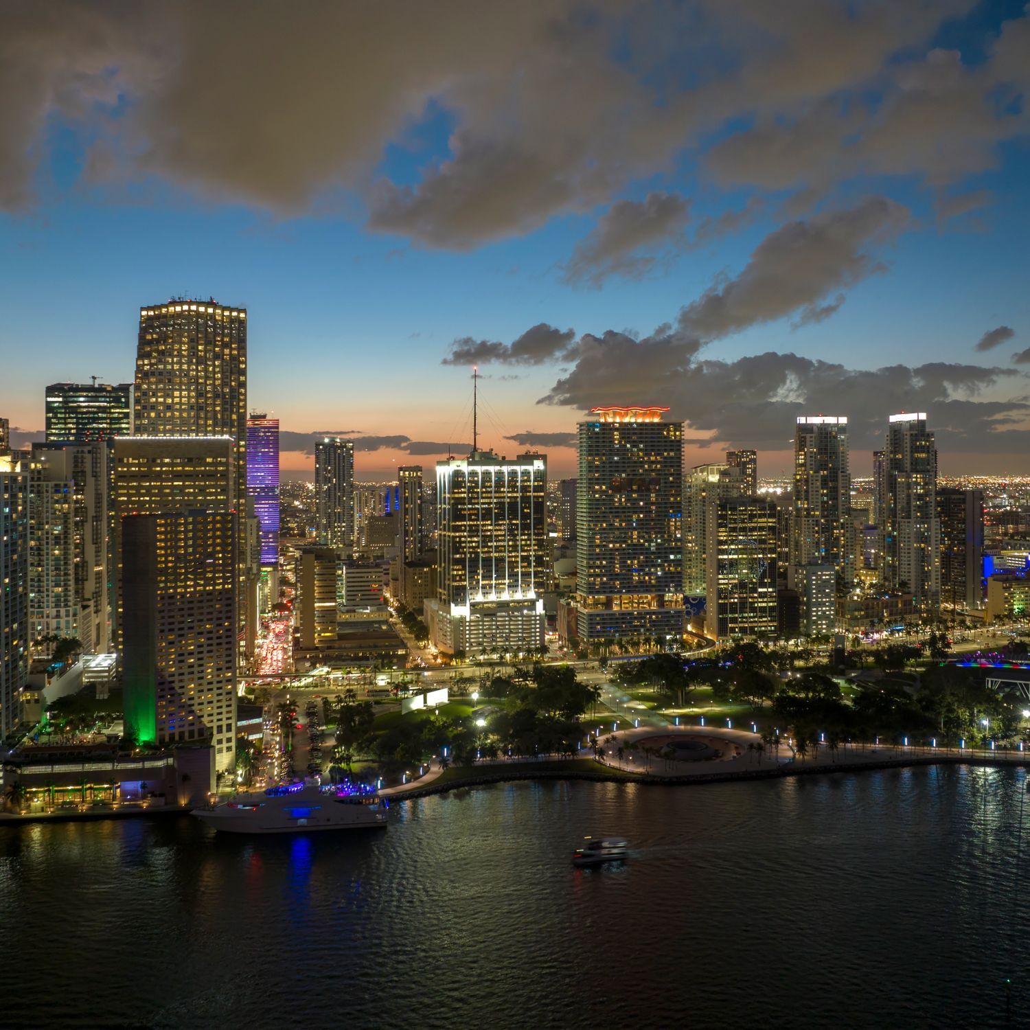 An aerial view of a city skyline at night