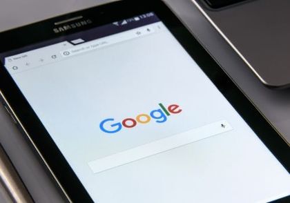 Tablet screen displaying the Google search page.