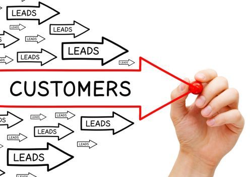 A hand is drawing arrows with leads pointing towards the word customers