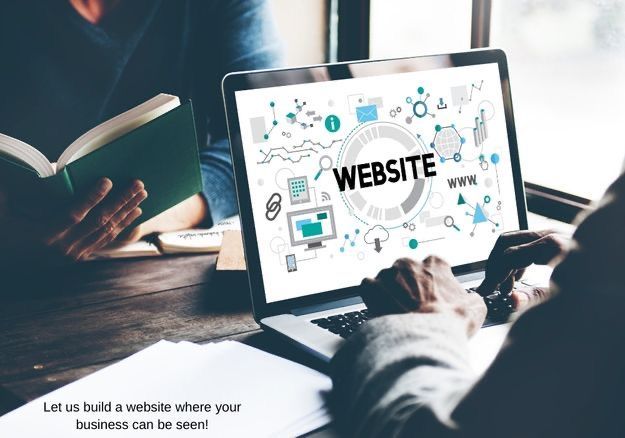 Person typing on laptop, screen displaying