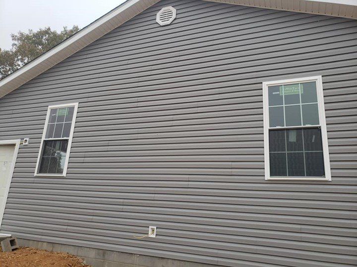 House Siding With Two Windows — Ledbetter, KY — Affordable Home Improvement of Kentucky