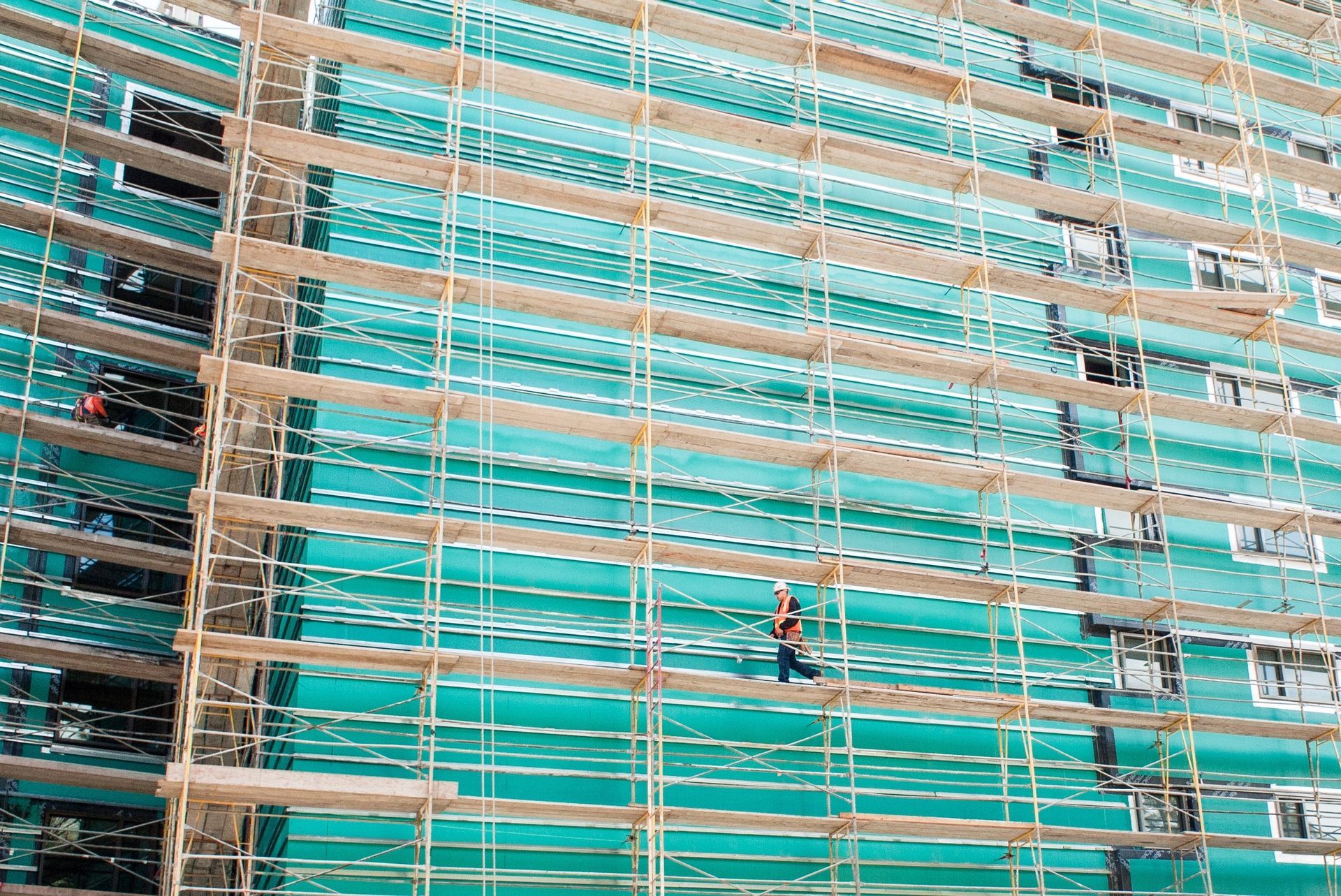 Man working on construction site scaffolding