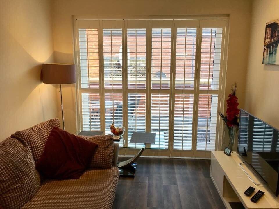 Slatted wooden shutters
