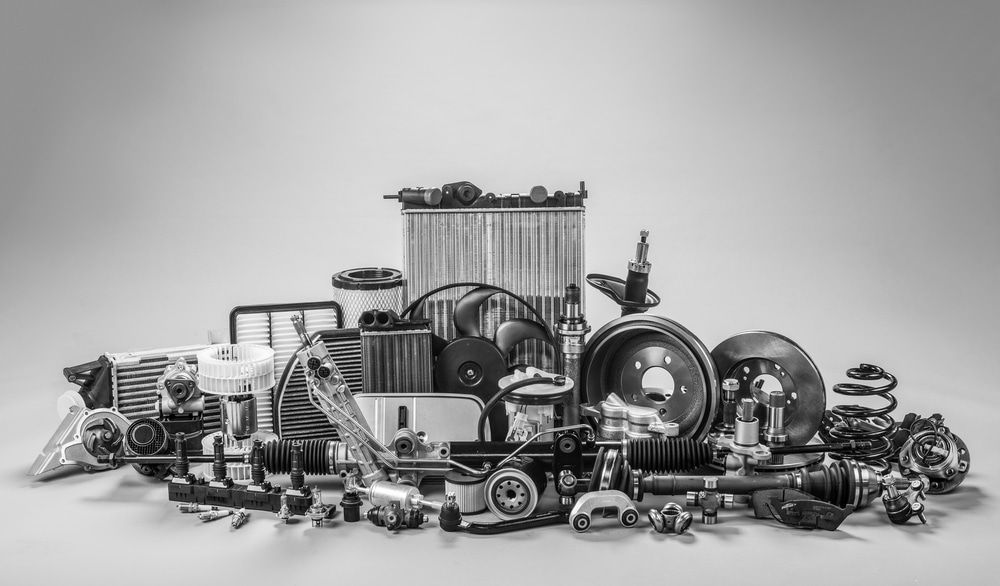 A Bunch of Car Parts Are Stacked on Top of Each Other on A Table — Multidrive Parts Australia in Gunnedah, NSW