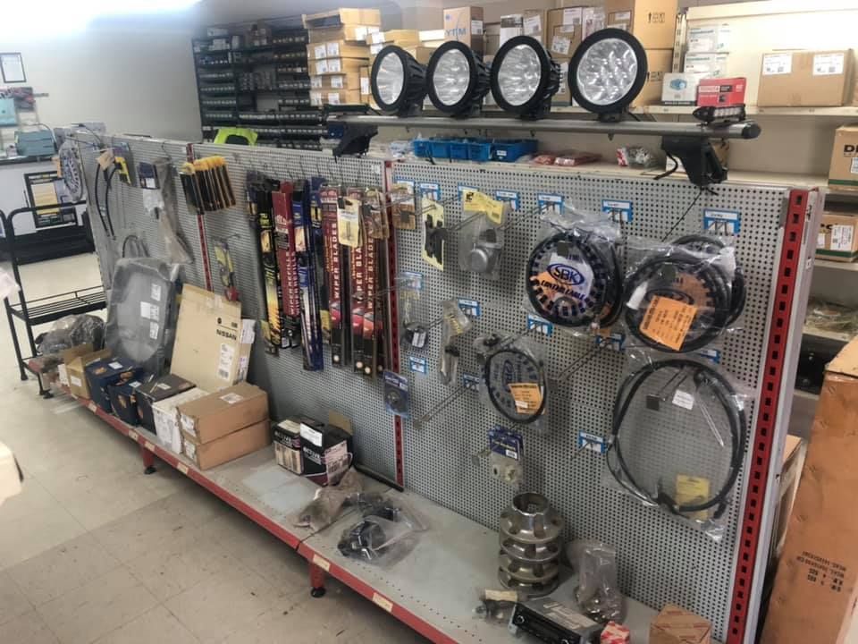 A row of shelves filled with a variety of car parts in a store — Multidrive Parts Australia in Scone, NSW