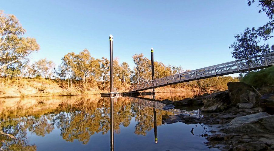 A Bridge Over a Body of Water with Trees in The Background — Multidrive Parts Australia in Goondiwindi, NSW