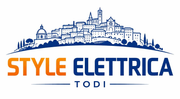 Logo Style Elettrica Todi con testo blu e arancione e grafica dello skyline di una città sopra.