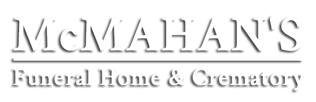 McMAHAN'S Funeral Home & Crematory logo with a shadow effect. Text is white on a dark background.