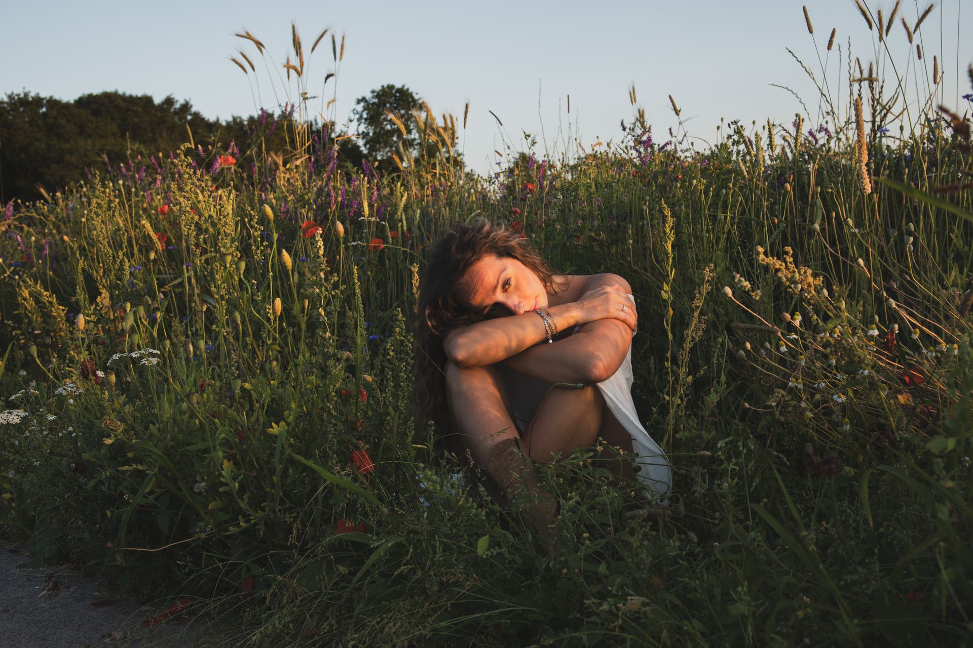 girl in field of flowers
