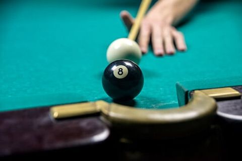 Targeting an eight ball in billiard - Pool league in Rhode Island & Massachusetts