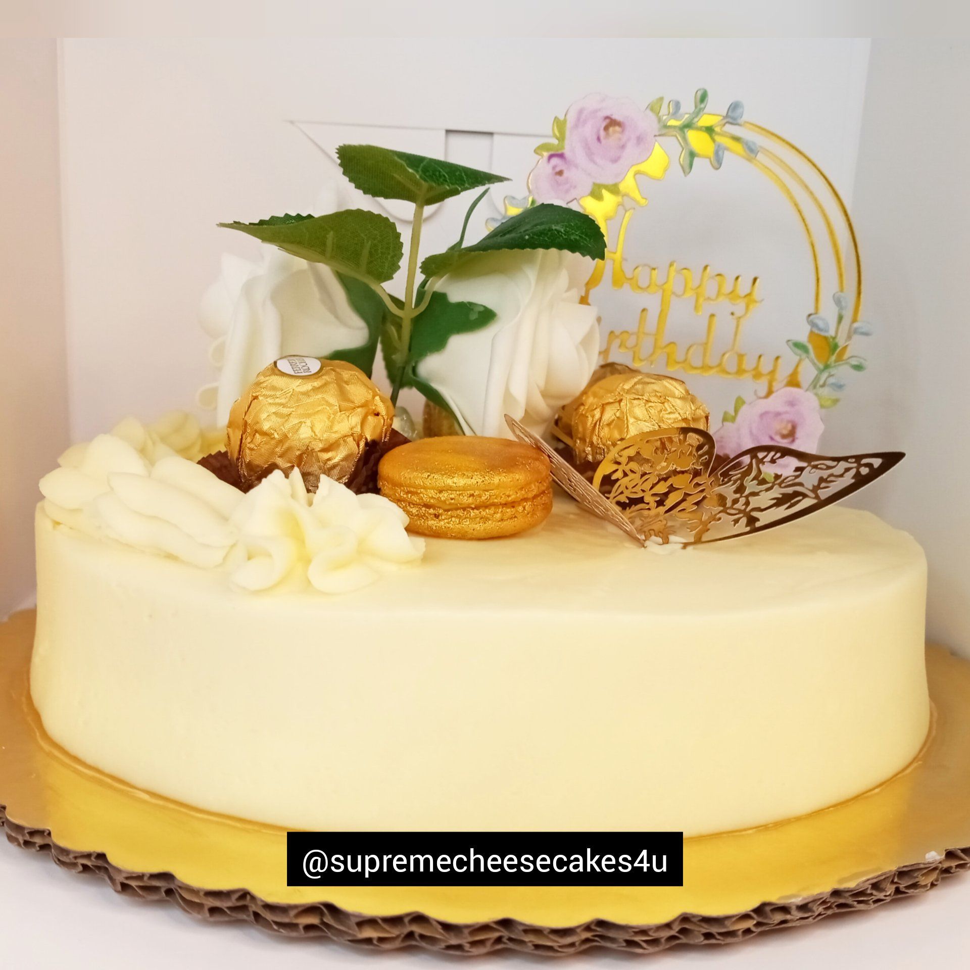 A birthday cake with a card that says happy birthday