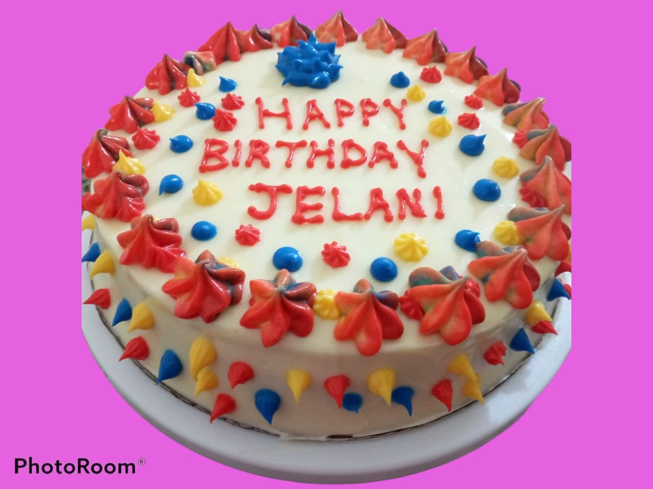 A birthday cake that says happy birthday jelani on it