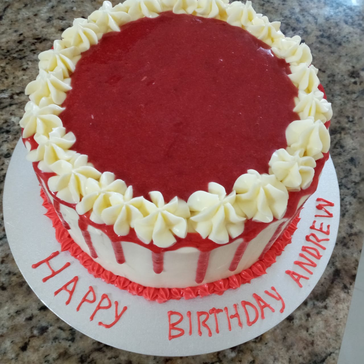 A cake that says happy birthday andrew on it