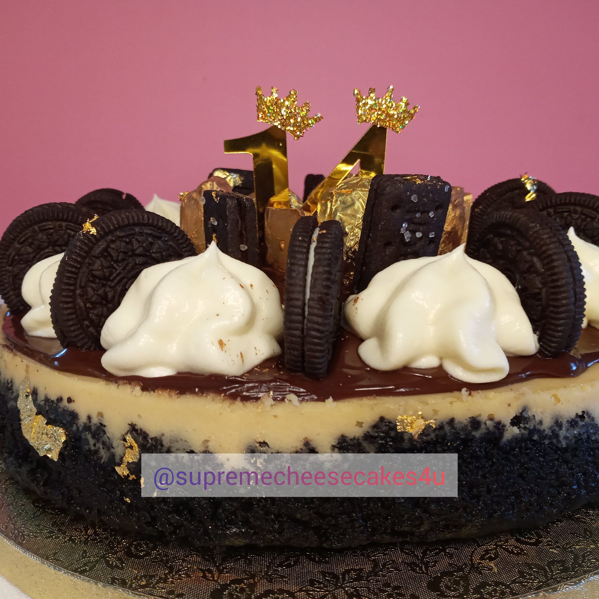 A supreme cheesecake with oreos and whipped cream