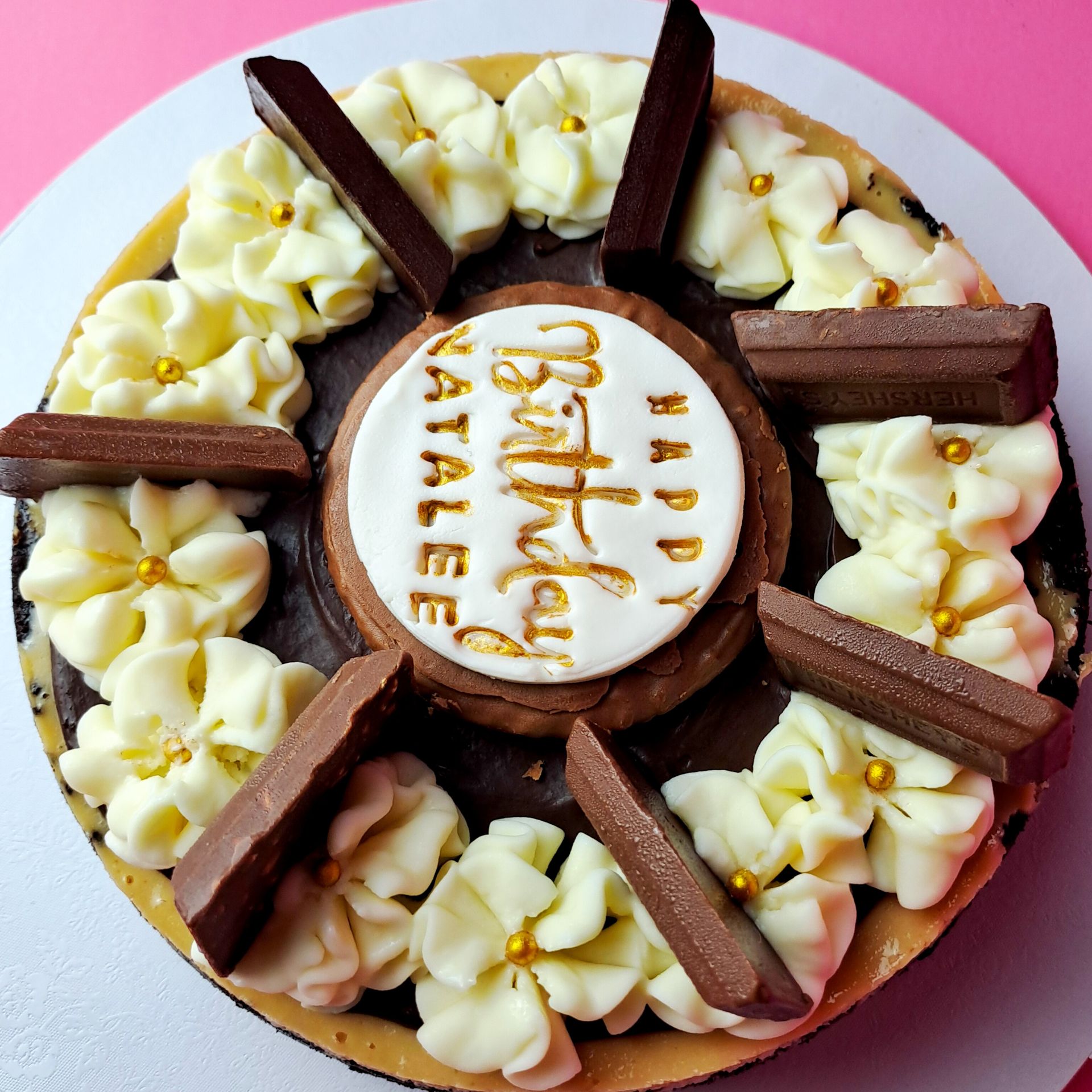 A cake that says happy birthday natalie on it