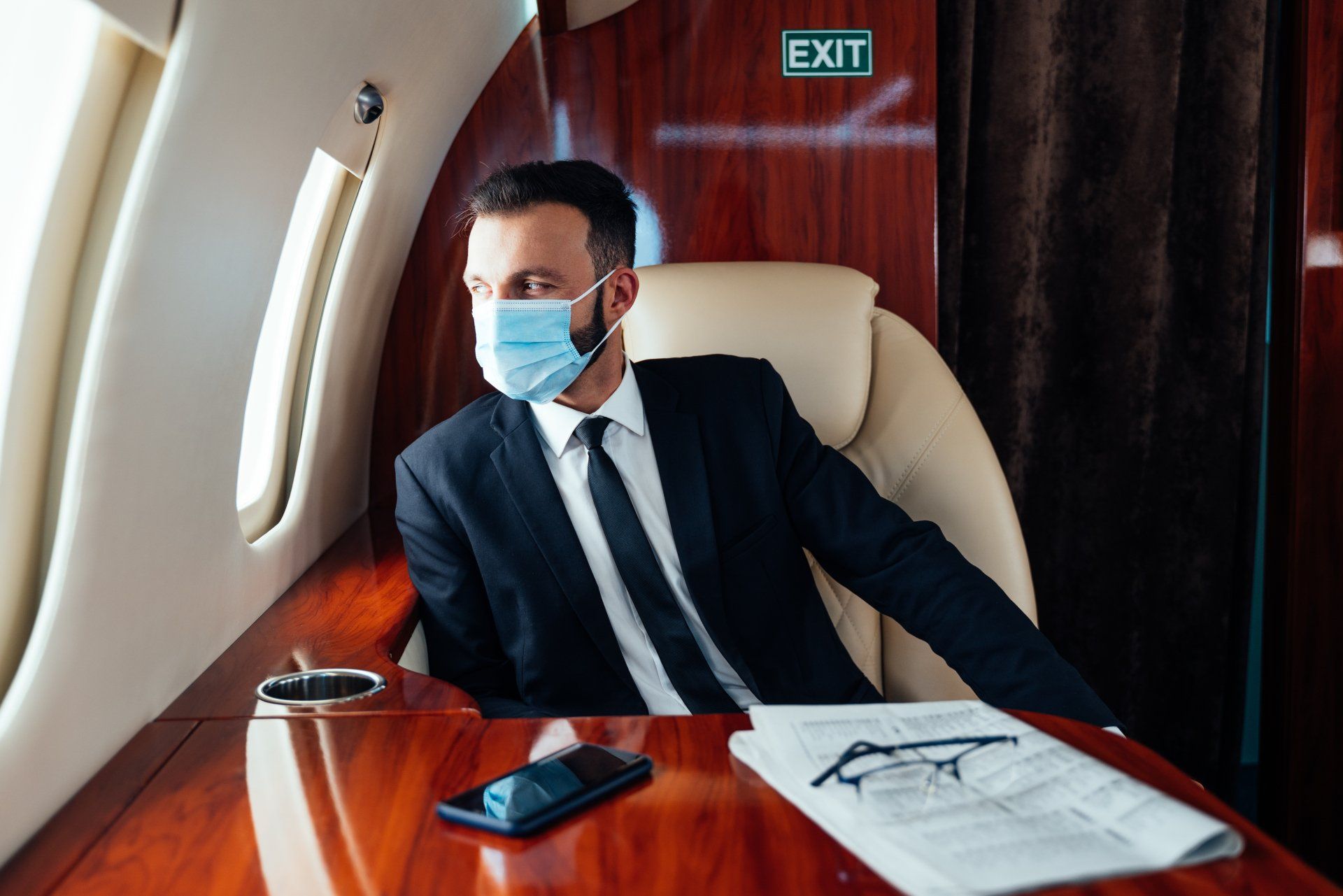 Businessman flying on his private jet. Concept about business, and transportation