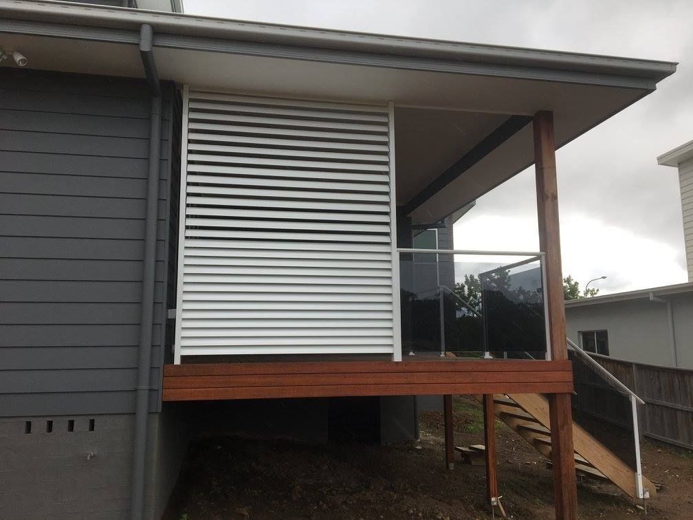 A House With a Balcony and Stairs on the Side — Riverside Aluminium & Stainless in Taree, NSW