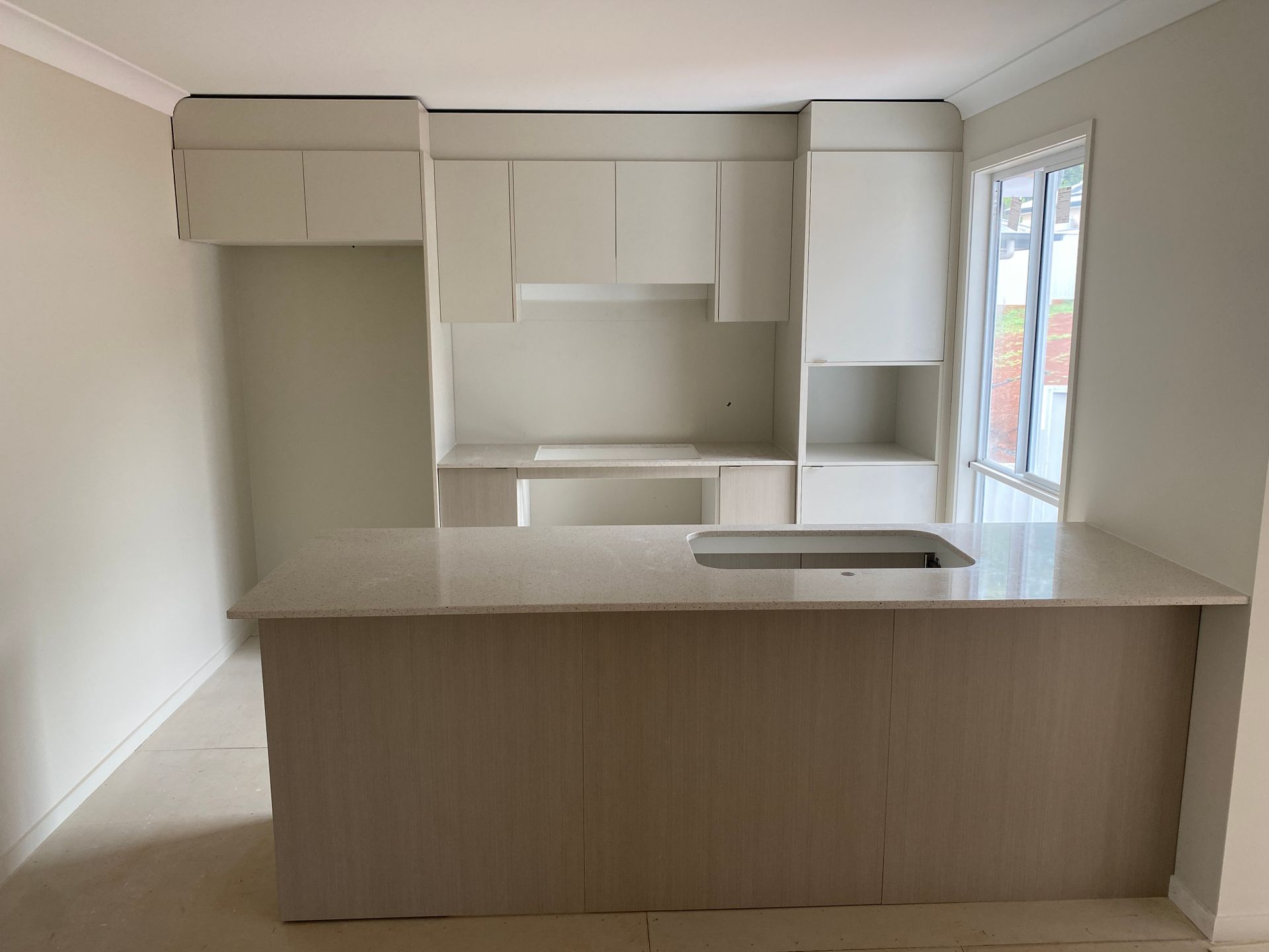 Handyman Cutting the a Piece of Wood — North Coast Building & Maintenance in Lismore, NSW