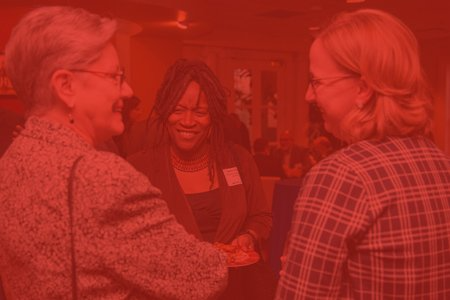Diverse group of women enjoying a networking event.