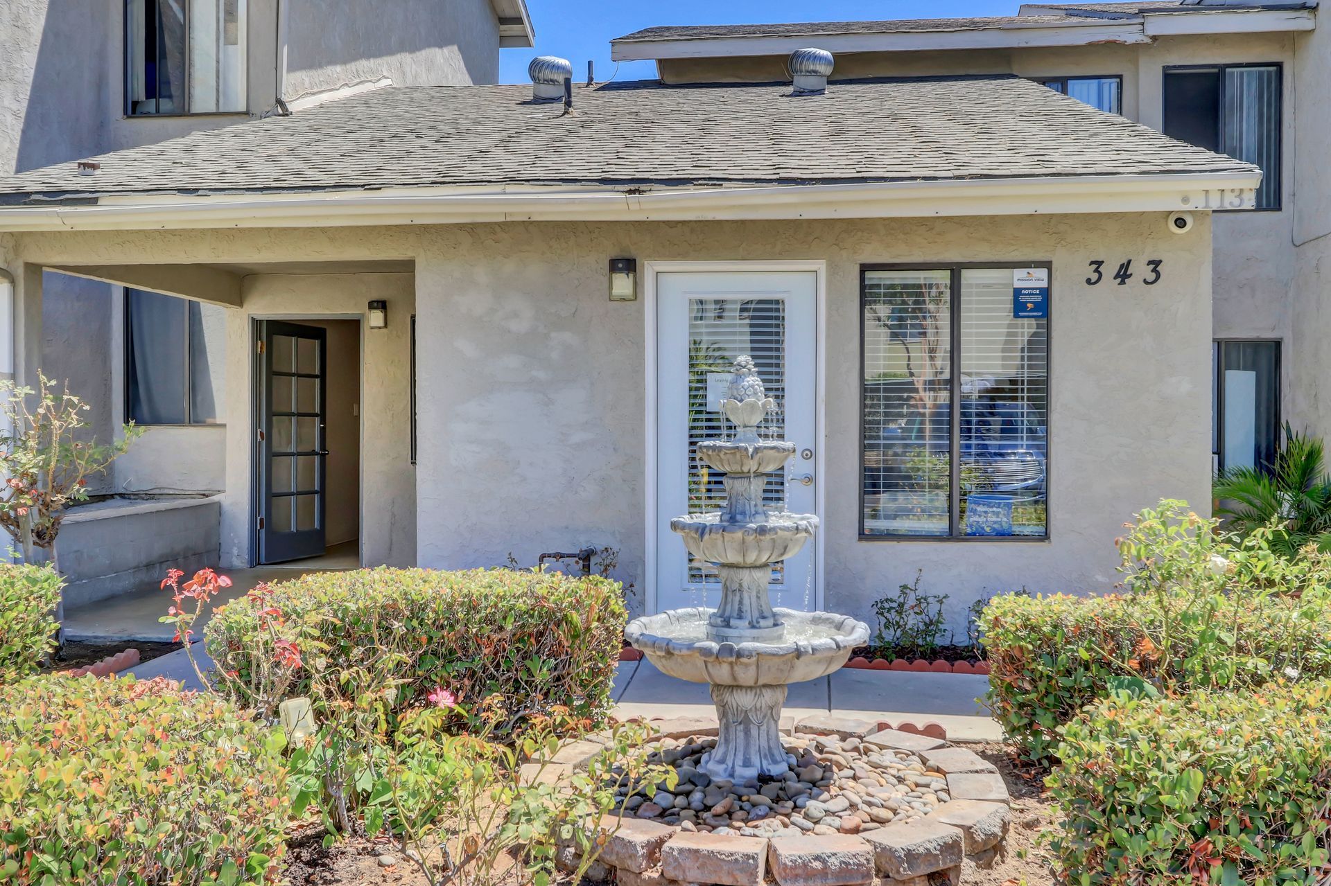 A house with the number 343 on the front of it