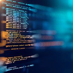 A close up of a computer screen with a lot of code on it.