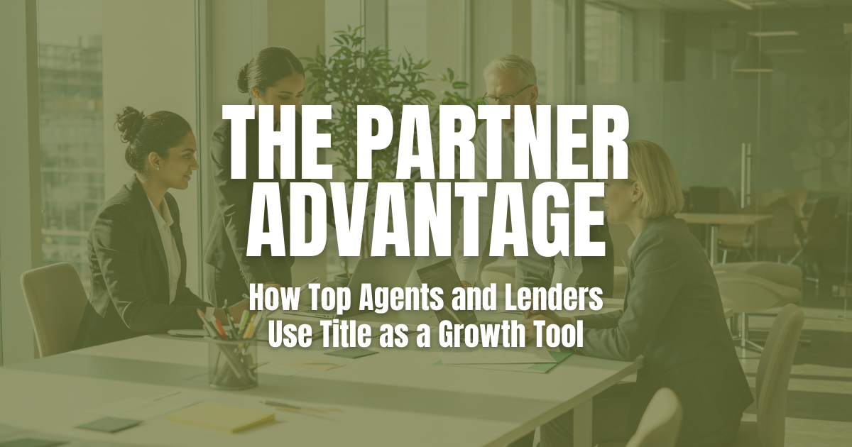 Real estate professionals meeting around a conference table.