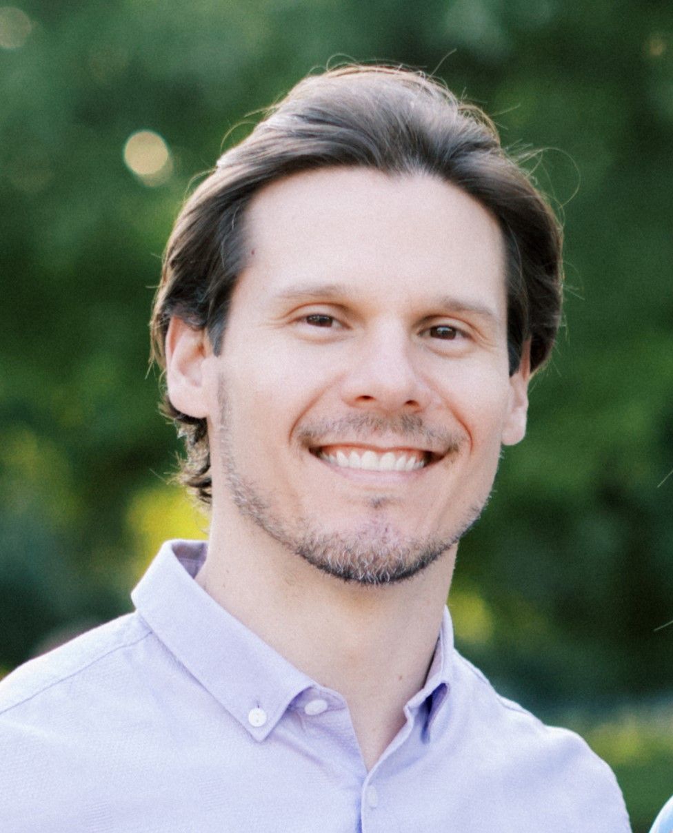 Team of digital marketers working around a table