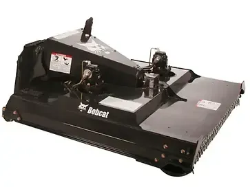 A bobcat lawn mower is sitting on a white surface.