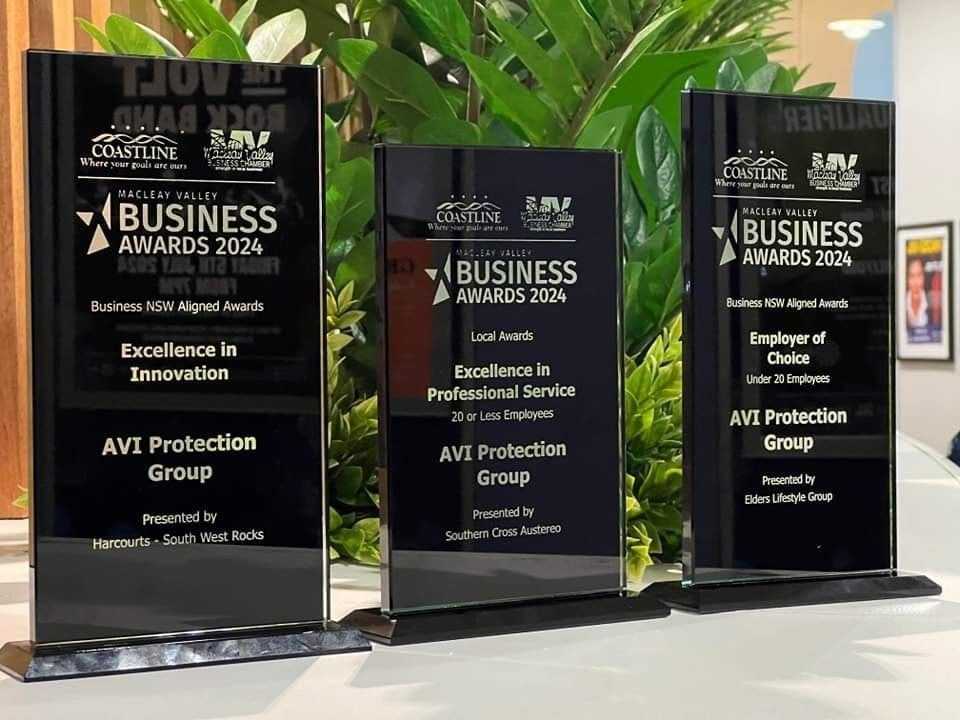 Three Business Awards are Sitting on a Table — AVI Protection Group Pty Ltd in West Kempsey, NSW