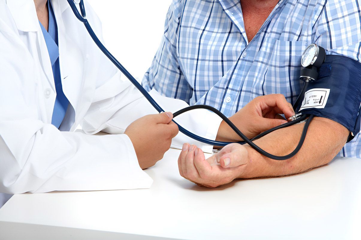 Man Having a Blood Pressure Check — AVI Protection Group Pty Ltd in Forster-Tuncurry, NSW