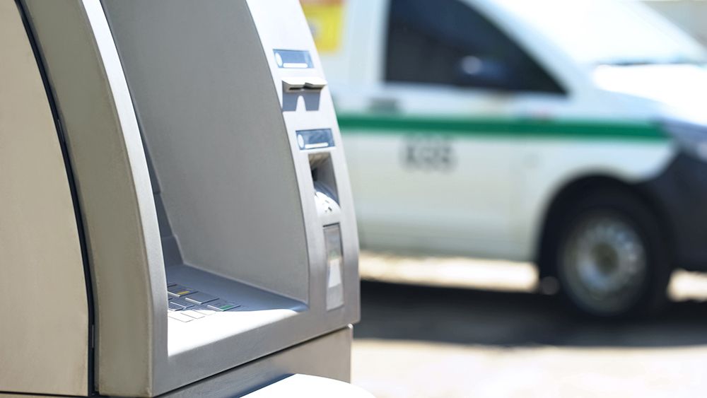 A White Van is Parked in Front of an Atm Machine — AVI Protection Group Pty Ltd in West Kempsey, NSW