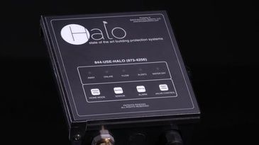 A black box with the word halo on it is sitting on a table.