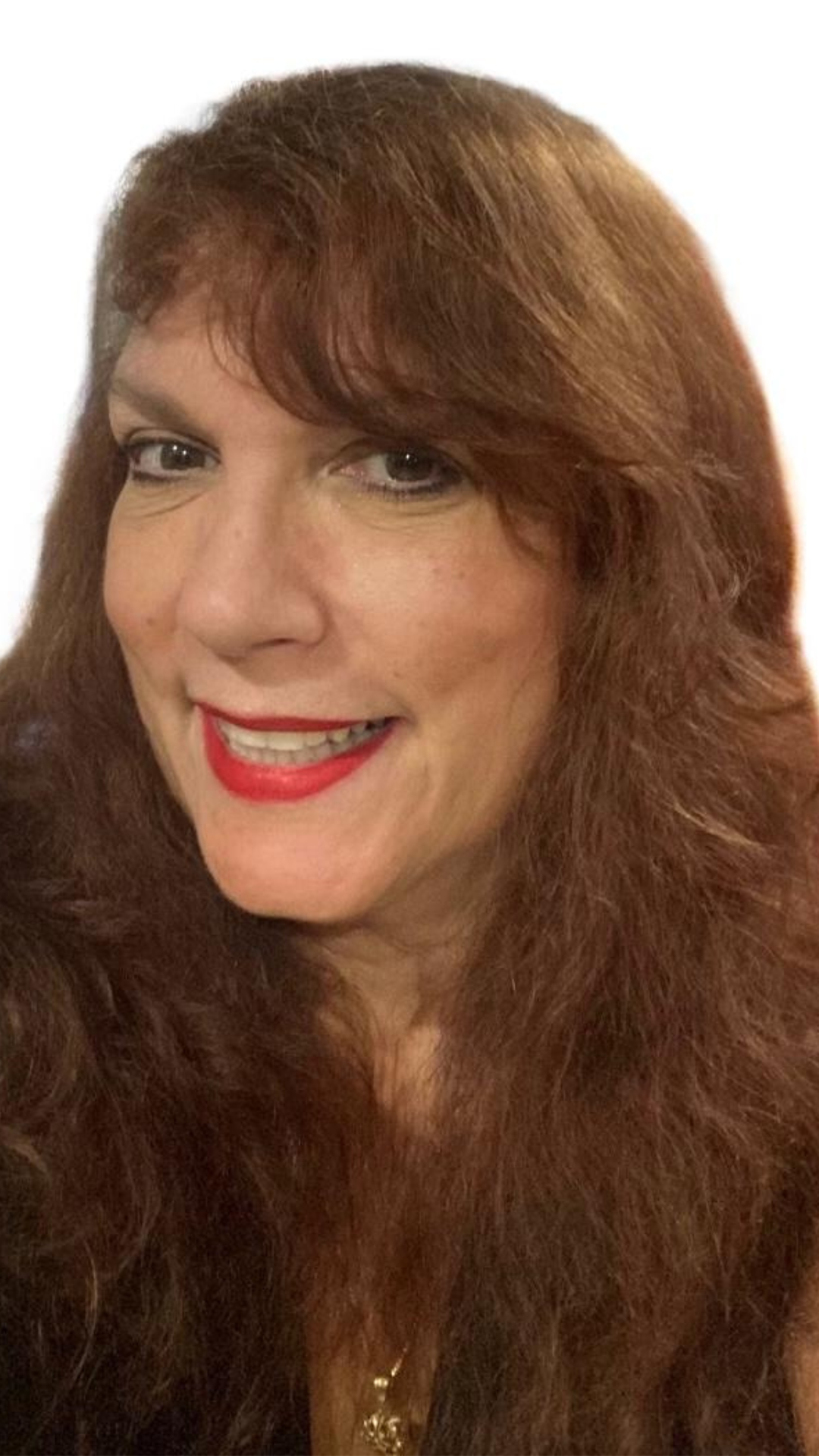 A woman with long brown hair and red lipstick is smiling for the camera.